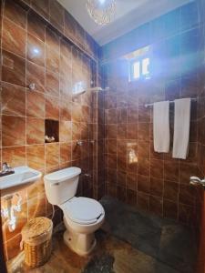 Koupelna v ubytování Hotel Yaan Chaca