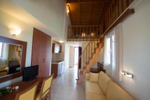 TV a/nebo společenská místnost v ubytování Summertime Inn