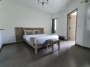 Кровать или кровати в номере Paradizo