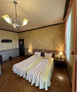Een bed of bedden in een kamer bij Guesthouse Petra