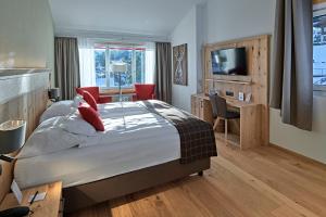 TV a/nebo společenská místnost v ubytování Hotel Bristol Relais du Silence Superior