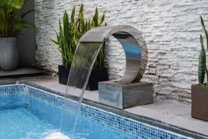 Bazén v ubytování Azor Hotel Cali Versalles nebo v jeho okolí