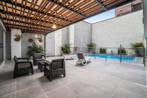 Bazén v ubytování Azor Hotel Cali Versalles nebo v jeho okolí