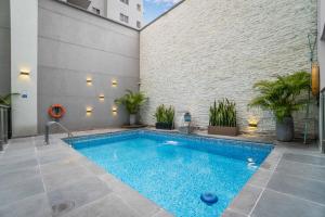 Bazén v ubytování Azor Hotel Cali Versalles nebo v jeho okolí