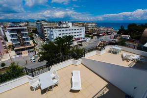a view of a city from the balcony of a building at Zeytindali Apart Hotel in Didim