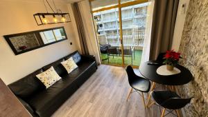 Posezení v ubytování A ESTRENAR PRECIOSOS APARTAMENTOS APARTHOTEL INTER2, NEW APARTMENTS lN APARTHOTEL 12 months open! self check in! RESERVA Garaje!