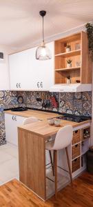 Kuchyň nebo kuchyňský kout v ubytování Azulejo Apartment