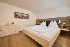 Postel nebo postele na pokoji v ubytování Appartement Emma