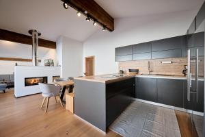Kuchyň nebo kuchyňský kout v ubytování Appartement Emma