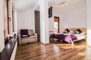Posteľ alebo postele v izbe v ubytovaní Dolina Resort Zakopane
