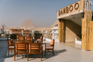 Foto da galeria de Jimmy Pyramids Hotel no Cairo