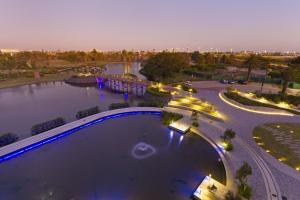 an overhead view of a pool at night at Bridgewater View 502 by HostAgents in Cape Town