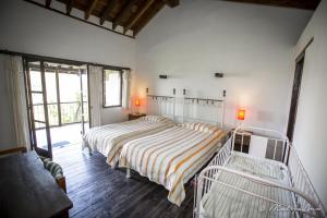 Säng eller sängar i ett rum på Ambelikos Traditional Agrohotel