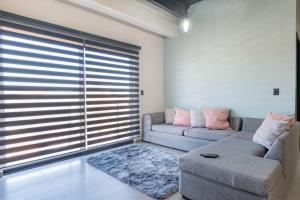 Posezení v ubytování Depa Industrial Moderno y Comodo
