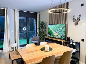 TV i/ili zabavni centar u objektu Luxe&Modern In Canillo, 1 Min Walk To Slopes l by BonesVacances