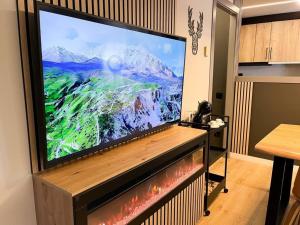 TV i/ili zabavni centar u objektu Luxe&Modern In Canillo, 1 Min Walk To Slopes l by BonesVacances