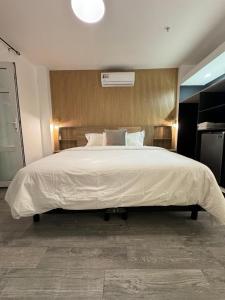 Voodi või voodid majutusasutuse HOTEL BALUARTE BOUTIQUE PANAMA toas