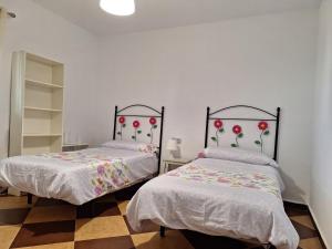 Postel nebo postele na pokoji v ubytování Villa La Hojilla relax o trabajo + 18 fotografií