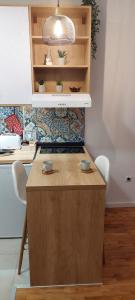 Kuchyň nebo kuchyňský kout v ubytování Azulejo Apartment