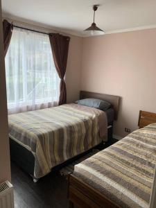 A bed or beds in a room at Departamento Vista al mar