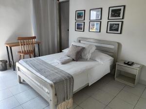 Postel nebo postele na pokoji v ubytování Hotel Casa de las Dos Palmas -Hotel Boutique