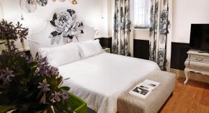 Postel nebo postele na pokoji v ubytování Cinque Rooms