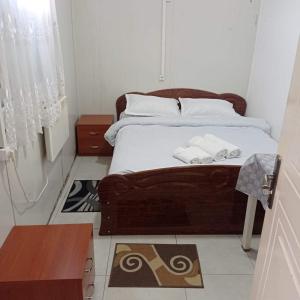 Een bed of bedden in een kamer bij hostel mari