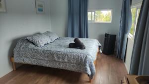 Postel nebo postele na pokoji v ubytování Lily Home