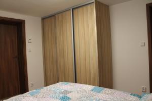 Postel nebo postele na pokoji v ubytování Apartmány 264