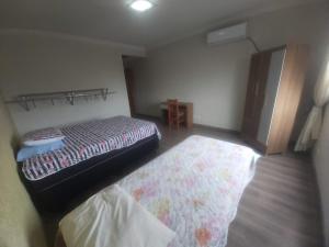 Una cama o camas en una habitación de Apartamento Margarida