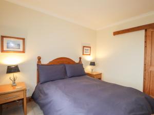 Letto o letti in una camera di MacKenzies Peak