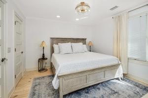 Ένα ή περισσότερα κρεβάτια σε δωμάτιο στο Saltwater Oaks +27 φωτογραφίες