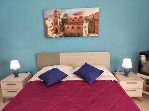 เตียงในห้องที่ Sicily Trinacria House