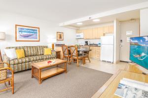 a living room with a couch and a table at Cozy & Diamond Head View at Waikiki with Parking in Honolulu +59 photos