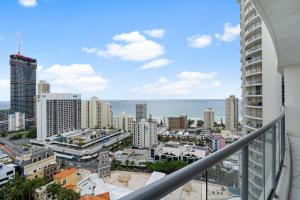a view of the city from the balcony of a building at Chevron Renaissance Ocean Views - Self Contained, Privately Managed Apartments in Gold Coast