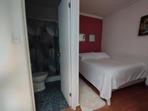 Un ou plusieurs lits dans un hébergement de l'établissement HOSTAL LA MODERNA