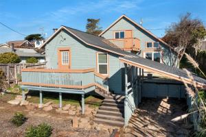 a house with a staircase in front of it at Sonoma Coast Retreat - Water Views BBQ WIFI in Bodega Bay