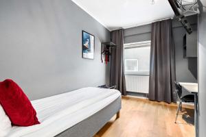 Llit o llits en una habitació de Aiden by Best Western Stockholm Arlanda Airport