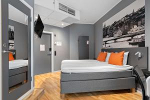 Llit o llits en una habitació de Aiden by Best Western Stockholm Arlanda Airport