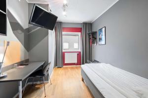 Televisor o centre d'entreteniment de Aiden by Best Western Stockholm Arlanda Airport