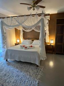 Кровать или кровати в номере Pousada Santo Mar