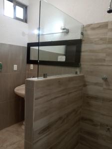 Phòng tắm tại El Mirador Holbox