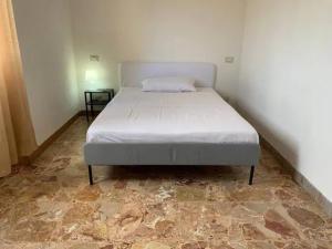 Ένα ή περισσότερα κρεβάτια σε δωμάτιο στο Daniele rooms