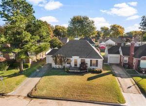 an aerial view of a house in a residential neighborhood at Vintage Chic Cottage in Tulsa