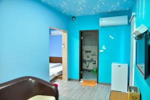 TV o dispositivi per l'intrattenimento presso Ye Yuan Star Homestay