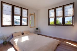 Postel nebo postele na pokoji v ubytování Dalaha Retreat
