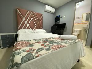 Postel nebo postele na pokoji v ubytování Casa Mango