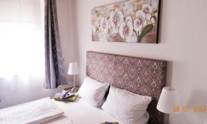 Ένα ή περισσότερα κρεβάτια σε δωμάτιο στο Hotel & Restaurant Arnoldusklause