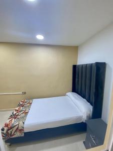 Postel nebo postele na pokoji v ubytování Casa Mango