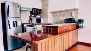 A cozinha ou cozinha compacta de Suite Lujo Panorámica en Guápulo